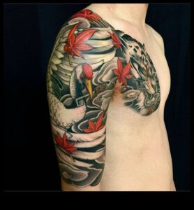 הקנבס של הטבע: החי והצומח חיים בקעקועים יפניים