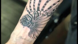 סנפירים ונוצות: צלול לתוך הרפתקאות קעקועים של בעלי חיים ימיים